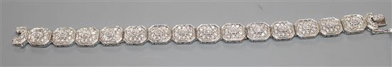 A modern 14k white metal and diamond encrusted octagonal link bracelet, 18.3cm, gross weight, 35.8 grams.
